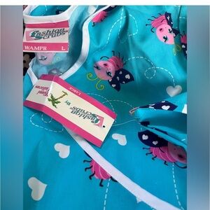 NWT women’s large scrub top